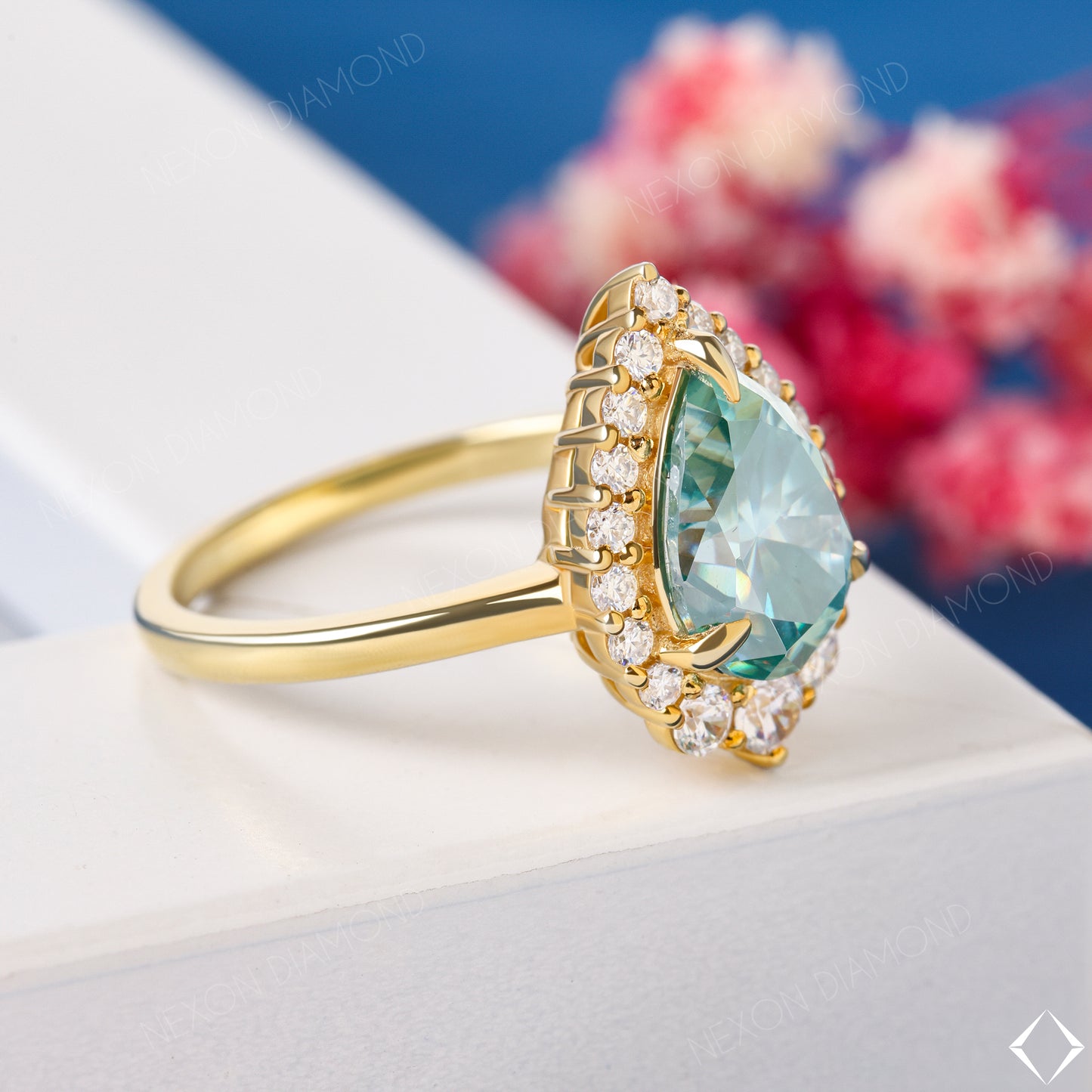 Stunning Pear Cut Sky Blue Aquamarine Gemstone Halo Engagement Ring